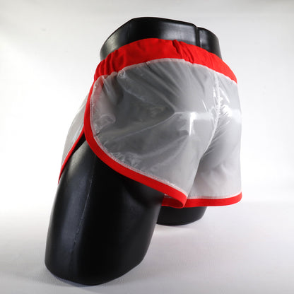 Mini - Short Vinyle – Blanc & Orange
Mini short vinyle blanc et orange effet brillant, créé par Omar Enrique Paris – mode masculine futuriste et style urbain.