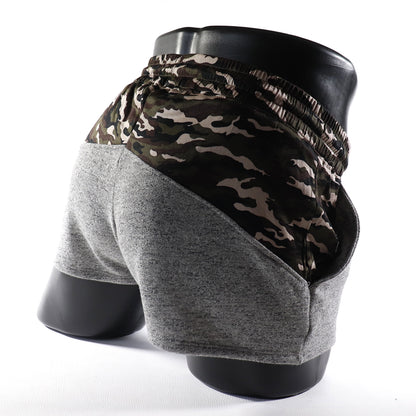 Mini - Short  -  Sport -Transparent – Noir - gris - blanc
Mini short de sport transparent noir avec design contrasté, créé par Omar Enrique Paris – mode masculine, vêtements sportifs et style audacieux.
Keywords: short sport homme, short transparent, mode masculine, Omar Enrique Paris