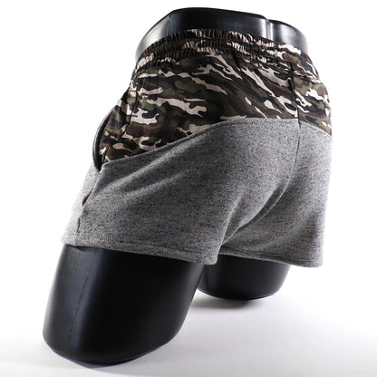 Mini - Short  -  Sport -Transparent – Noir - gris - blanc
Mini short de sport transparent noir avec design contrasté, créé par Omar Enrique Paris – mode masculine, vêtements sportifs et style audacieux.
Keywords: short sport homme, short transparent, mode masculine, Omar Enrique Paris